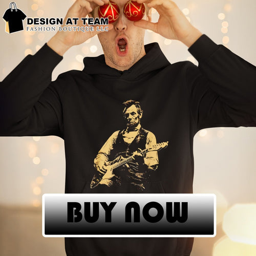 Abraham Lincoln playing electric guitar on a black cotton crew neck unisex shirt