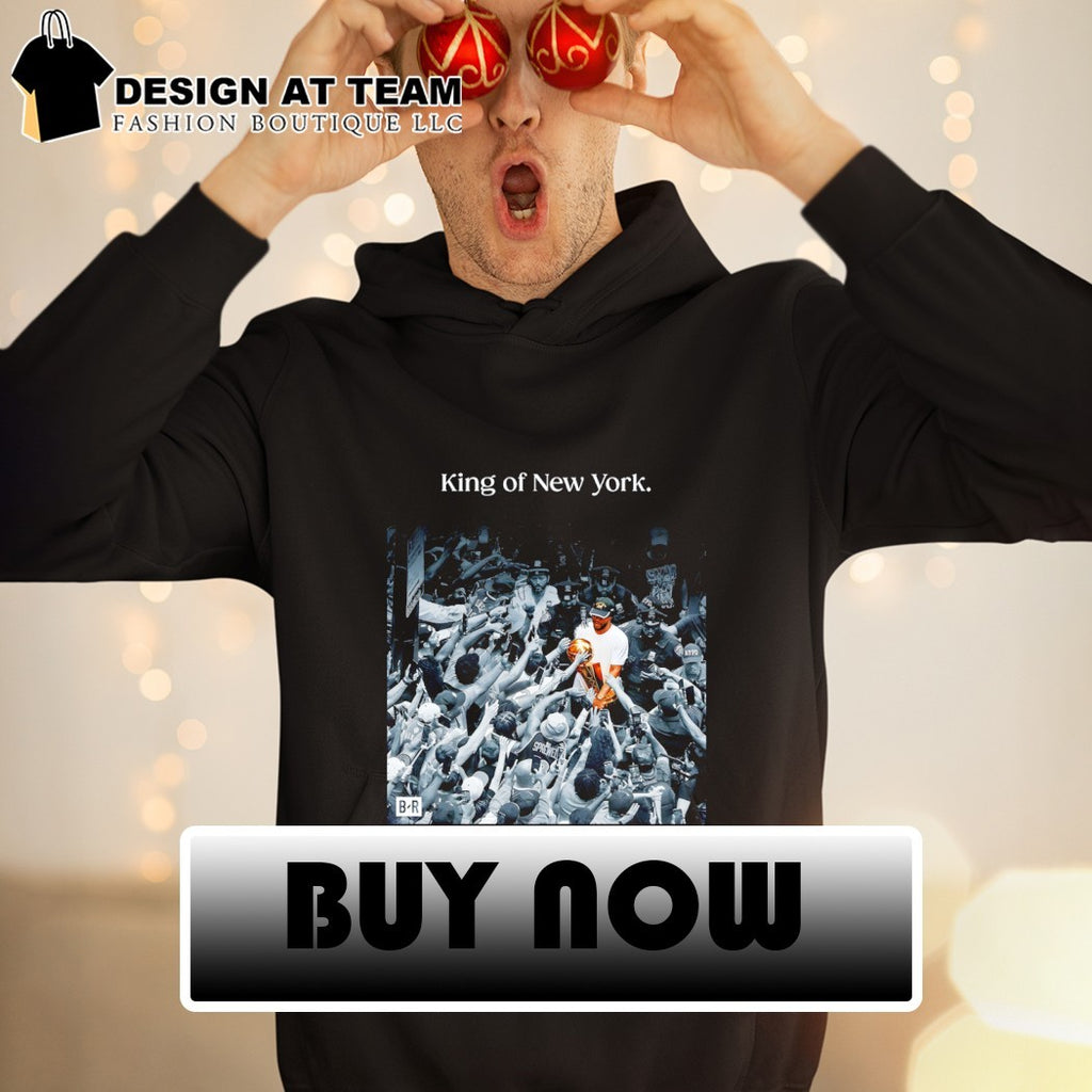 Jalen Brunson NBA trophy holding fan crowd celebration King of New York shirt