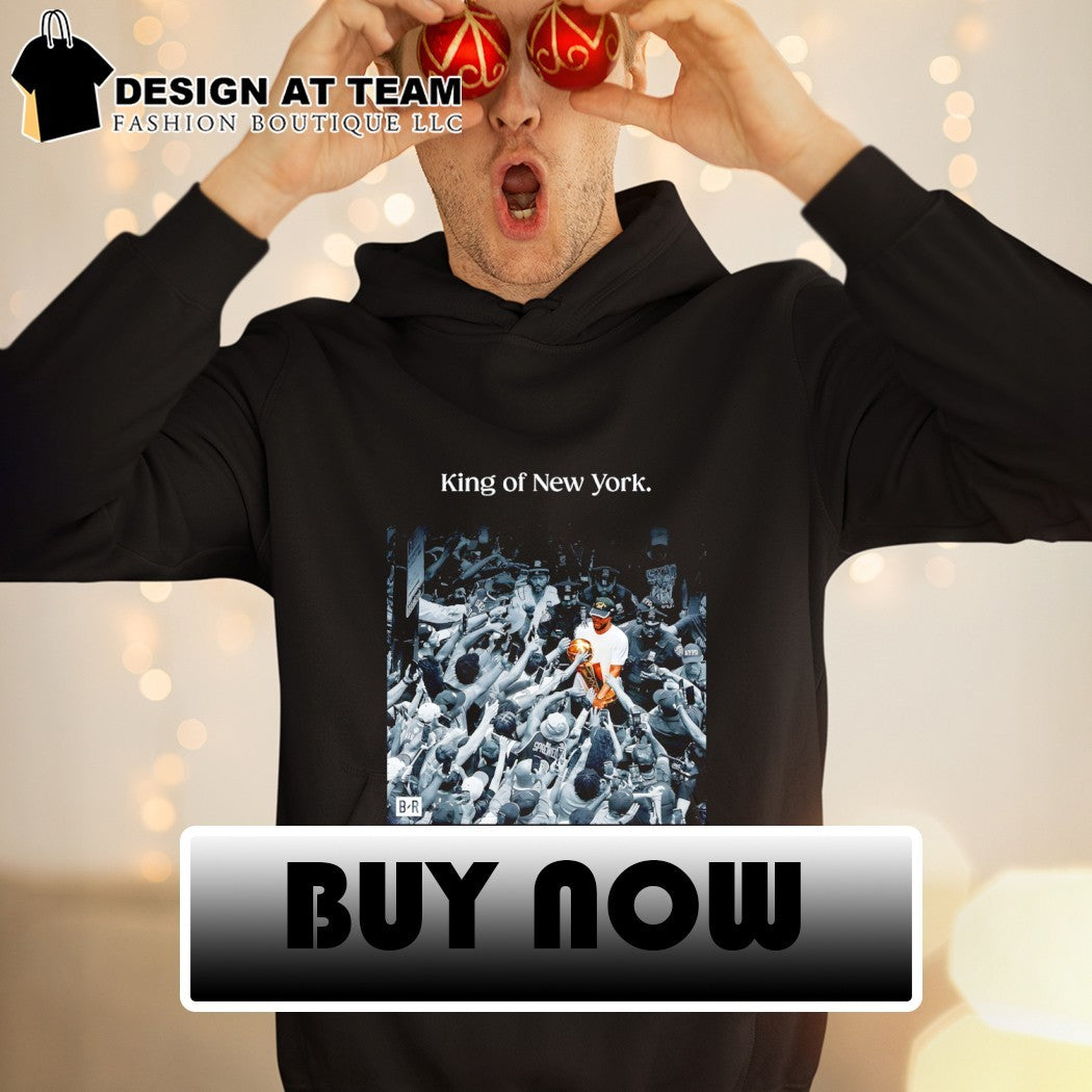 Jalen Brunson NBA trophy holding fan crowd celebration King of New York shirt