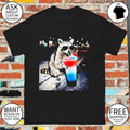 Raccoon holding a red white and blue slushy with popsicle shirt