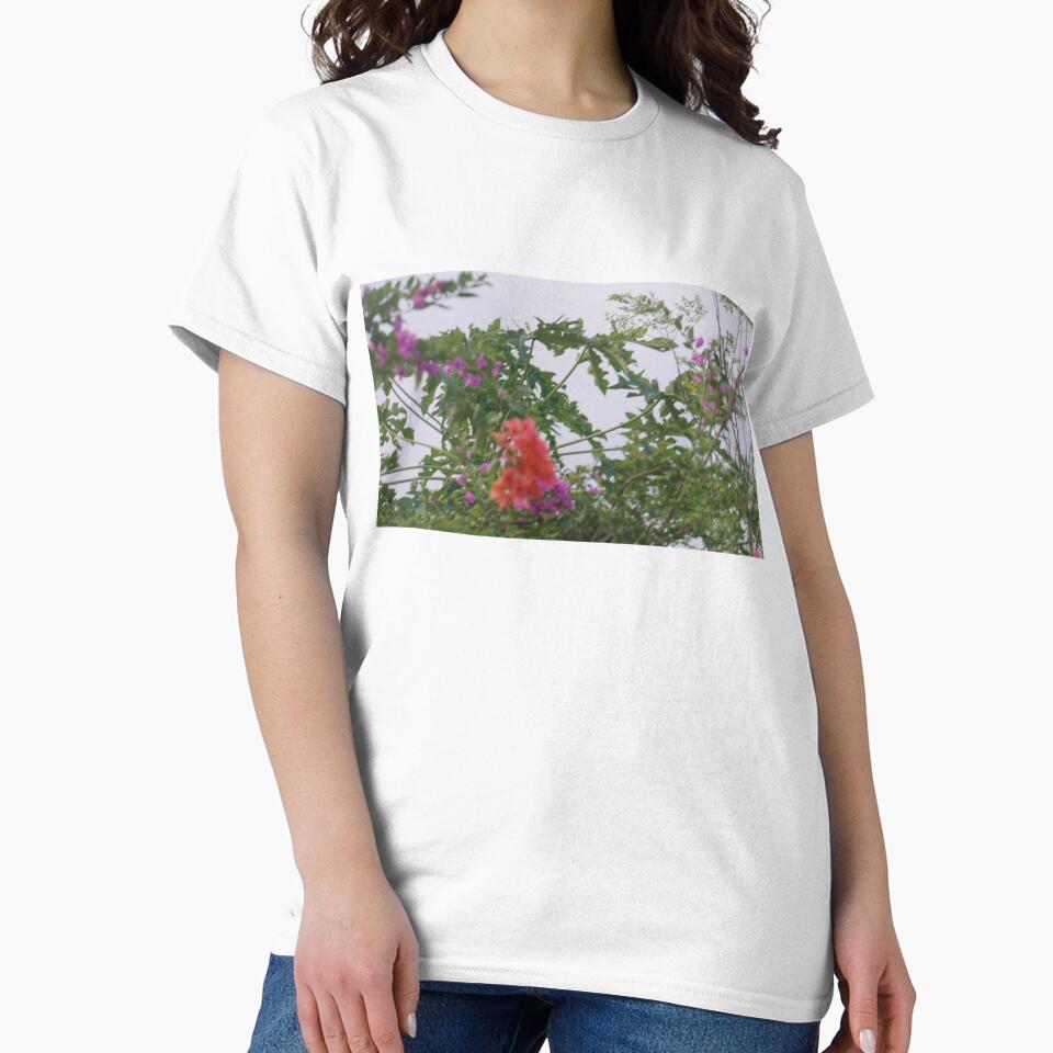Colorful Blossoms Amidst Lush Green Foliage by wegotfreeaco