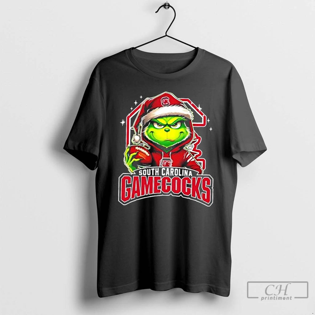 Premium Grinch Is Holding A Ball And Smiling At South Carolina Gamecocks Fans Christmas