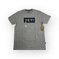 Yeti Men's Logo Badge T-Shirt Gray with Blue Logo Badge