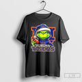 Premium Grinch Is Holding A Ball And Smiling At Auburn Tigers Fans Christmas T Shirts